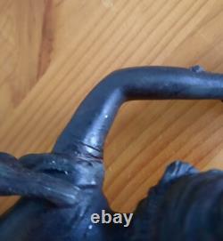 ART NOUVEAU CLOCK Subject Regule bronze patina on pink marble, signed