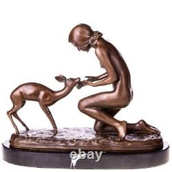 Antique bronze sculpture of a woman with a deer on black marble Signed