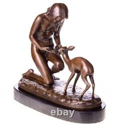 Antique bronze sculpture of a woman with a deer on black marble Signed