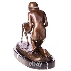 Antique bronze sculpture of a woman with a deer on black marble Signed