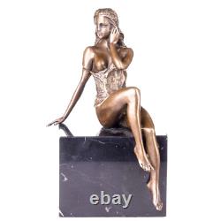 Antique female bronze nude figurine on black marble