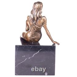 Antique female bronze nude figurine on black marble