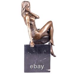 Antique female bronze nude figurine on black marble