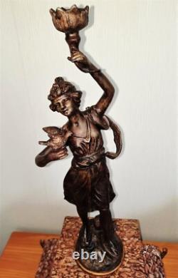 Art Nouveau Mantel Clock, patinated spelter figure with bronze finish on pink marble, signed