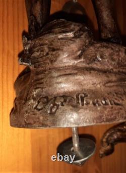 Art Nouveau Mantel Clock, patinated spelter figure with bronze finish on pink marble, signed