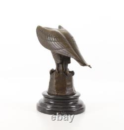 Bronze Eagle Sculpture on a Black Marble Base after Coenraad