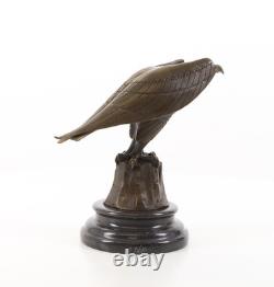 Bronze Eagle Sculpture on a Black Marble Base after Coenraad