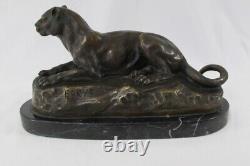 Bronze Lying Panther, signed BARYE on marble pedestal.