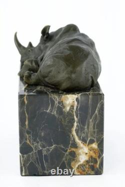 Bronze Rhinoceros Sculpture on a Black Marble Base after Milo