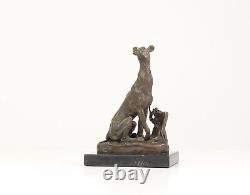 Bronze Sculpture of a Greyhound Sitting on a Black Marble