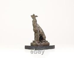 Bronze Sculpture of a Greyhound Sitting on a Black Marble