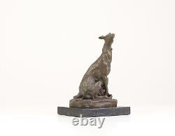 Bronze Sculpture of a Greyhound Sitting on a Black Marble