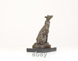 Bronze Sculpture of a Greyhound Sitting on a Black Marble