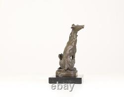 Bronze Sculpture of a Greyhound Sitting on a Black Marble