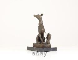 Bronze Sculpture of a Greyhound Sitting on a Black Marble