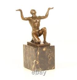 Bronze Sculpture of a Kneeling Male Nude on Black Marble