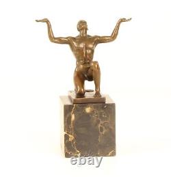 Bronze Sculpture of a Kneeling Male Nude on Black Marble