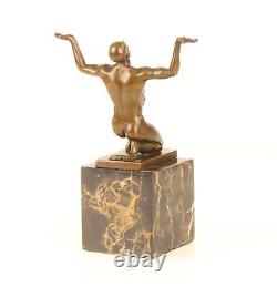 Bronze Sculpture of a Kneeling Male Nude on Black Marble