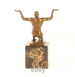 Bronze Sculpture of a Kneeling Male Nude on Black Marble