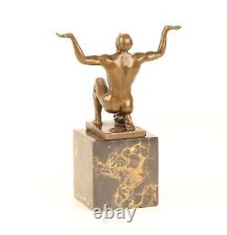 Bronze Sculpture of a Kneeling Male Nude on Black Marble