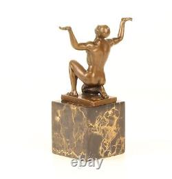 Bronze Sculpture of a Kneeling Male Nude on Black Marble