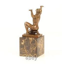 Bronze Sculpture of a Kneeling Male Nude on Black Marble