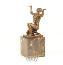 Bronze Sculpture of a Kneeling Male Nude on Black Marble