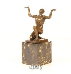 Bronze Sculpture of a Kneeling Male Nude on Black Marble