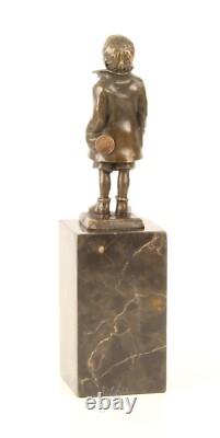 Bronze Sculpture of a Little Boy on a Black Marble