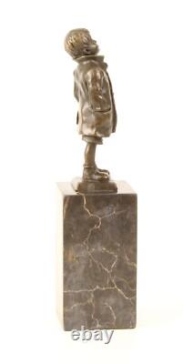 Bronze Sculpture of a Little Boy on a Black Marble