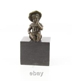 Bronze Sculpture of a Little Girl on Black Marble