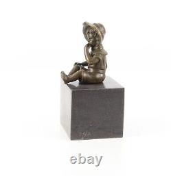 Bronze Sculpture of a Little Girl on Black Marble