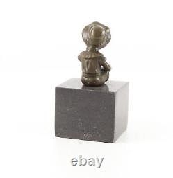 Bronze Sculpture of a Little Girl on Black Marble