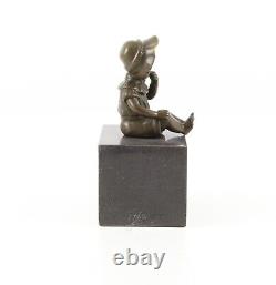 Bronze Sculpture of a Little Girl on Black Marble