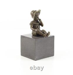 Bronze Sculpture of a Little Girl on Black Marble