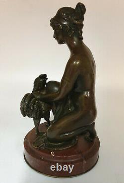 Bronze Woman With Rooster Signed Moret Xixeme On A Red Marble Base Turquin