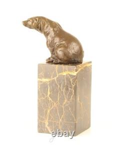 Bronze bear sculpture on a black marble base after Milo
