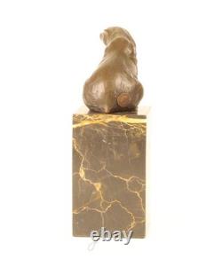 Bronze bear sculpture on a black marble base after Milo
