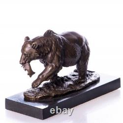 Bronze bear sculpture with fish on black marble Signed