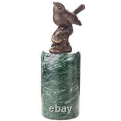 Bronze bird sculpture on green marble after Milo