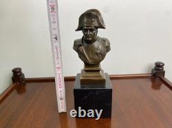 Bronze bust of Napoleon on a black marble base after A. Canova