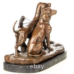 Bronze hunting dog sculpture on a black marble base after A. Cain