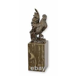 Bronze rooster sculpture on a black marble base, signed