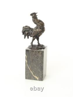 Bronze rooster sculpture on a black marble base, signed