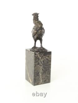 Bronze rooster sculpture on a black marble base, signed