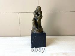 Bronze sculpture The Thinker on black marble after Auguste Rodin