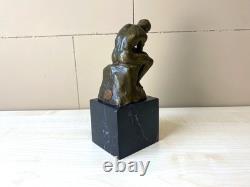Bronze sculpture The Thinker on black marble after Auguste Rodin