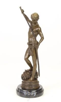 Bronze sculpture of David on a black marble base after Antonin Mercier