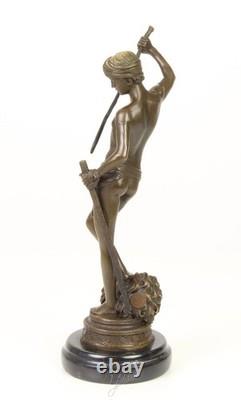 Bronze sculpture of David on a black marble base after Antonin Mercier