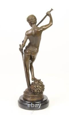 Bronze sculpture of David on a black marble base after Antonin Mercier